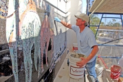 Installation of the restored Rolling Hills Mural 2009